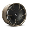 CHELA Felge in Matte Bronze mit Satin-Carbon-Aerodisc, Schrägansicht der Flow-Formed-Konstruktion und bronzefarbenen Oberfläche.