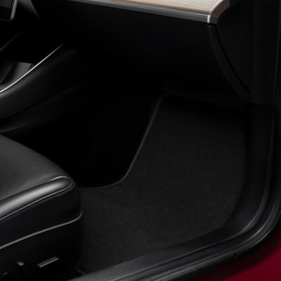 Maßgeschneiderte Fußmatten Tesla Model 3 Premium Velours in edlem Schwarz, perfekt passend für alle Tesla Model 3 Innenräume.