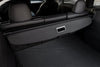 Tesla Model Y Kofferraumabdeckung in eingerollter Position mit OEM-Design und perfekter Integration in den Innenraum des Juniper 2025+.