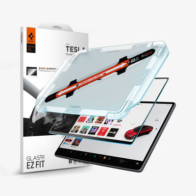 Spigen Tesla Displayschutz mit Montagerahmen und Touchscreen vor einer weißen GLAS.tR EZ FIT-Verpackung mit orangefarbenem Logo.