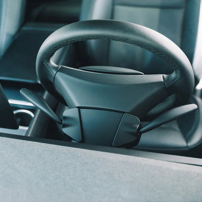 Detailaufnahme der beiden montierten tesla blinkerhebel nachruesten, links und rechts am Lenkrad, hochwertiges OEM-Feeling.