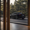 Heckansicht Tesla Model 3 Performance mit felgen tesla model 3 in 19 Zoll Razor V2 im Naturambiente.