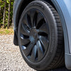 Tesla Model Y Juniper Radkappen 19 Zoll Uberturbine von der Seite: schwarze gebogene Speichen, runde Mittelkappe und Ventil