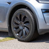 Tesla Model Y Juniper Radkappen 19 Zoll Uberturbine am Vorderrad, mit Tesla-Logo und grauer Frontstoßstange im Bild
