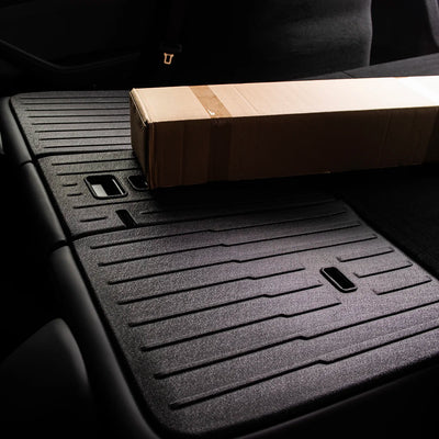 Tesla Model Y Rücksitz Schutz Juniper 2025+ Innenansicht mit strukturierter Oberfläche, langlebiger Schutz für rücksitzbank und Rückenlehnen.