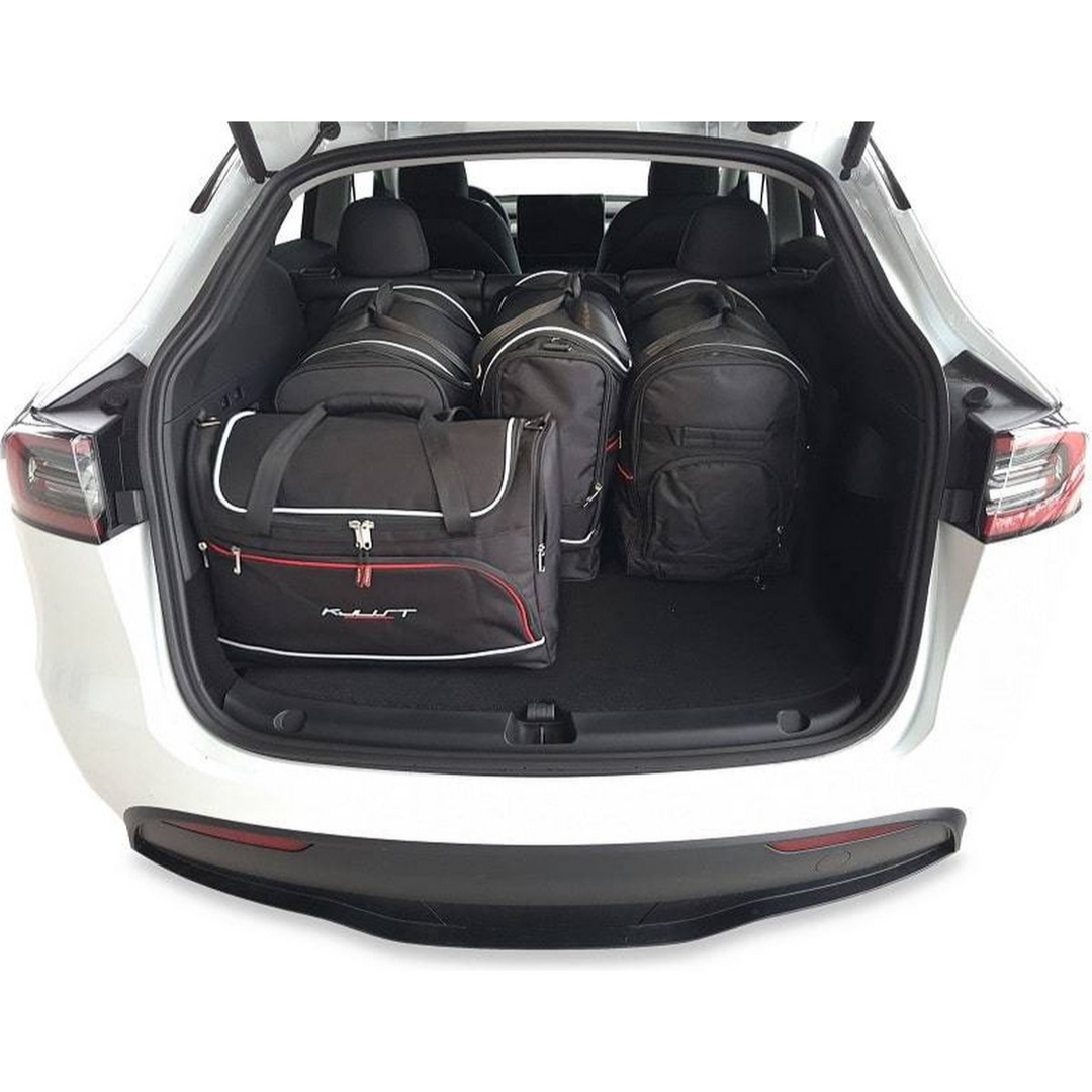 https://www.meinteslazubehoer.de/cdn/shop/products/TeslaModelYReistassenopmaat5-deligTrunkOrganizerWeekendtassenAutoInterieurAccessoires5.png?v=1644591277&width=1080